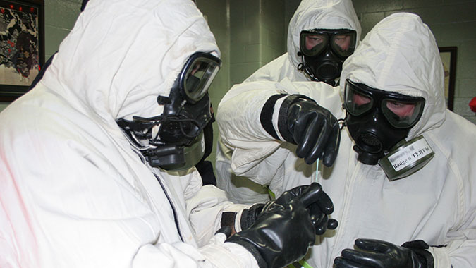 Emergency responders attending the Technical Emergency Response Training (TERT) course sample for the possible detection of the biological material Ricin. These students worked with biological materials Ricin and Anthrax, and also nerve agents GB and VX, during their course.