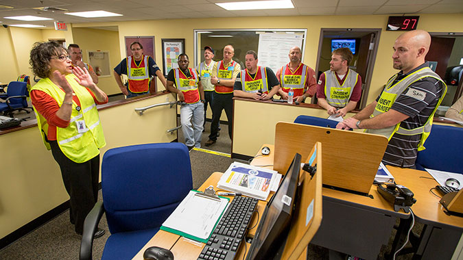 Healthcare professionals pause to listen to an instructor during the Healthcare Leadership for Mass Casualty Incidents (HCL) course at FEMA’s Center for Domestic Preparedness in Anniston, Ala. The 40 employees represented 13 different hospitals in the Northeast Tennessee area. (Photo by Benjamin Cro