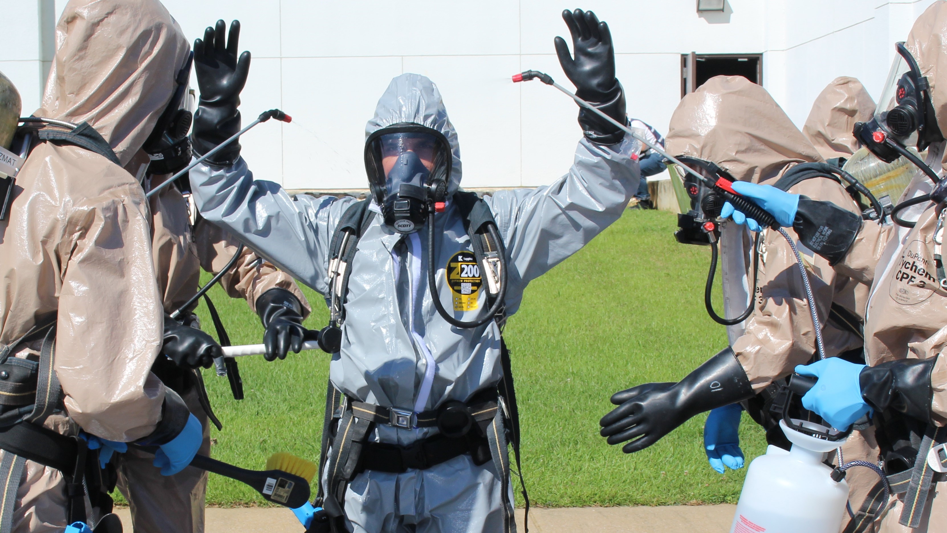 A team of responders ‘decons’ a fellow responder during an Integrated Capstone Event at the CDP.