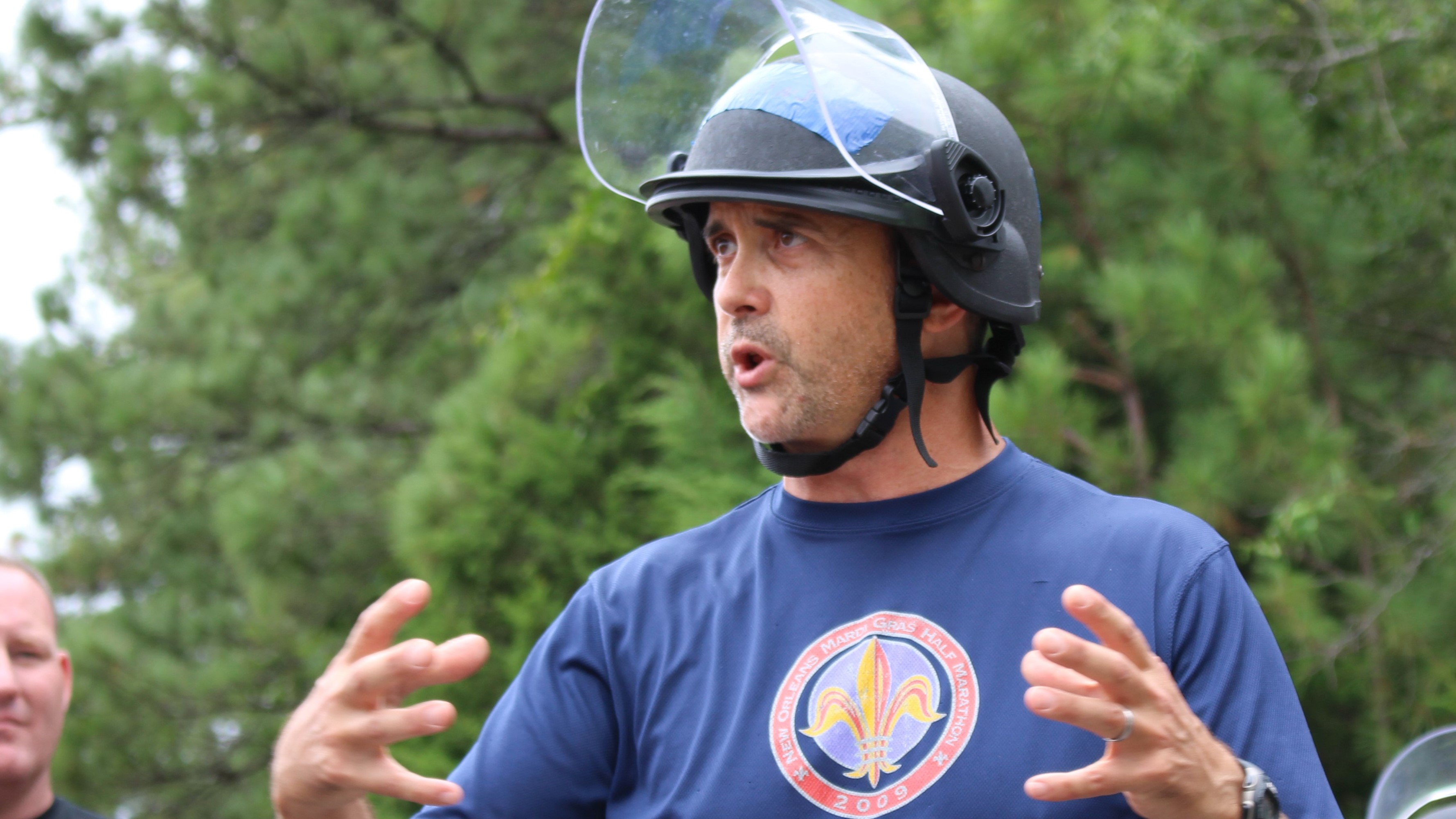 A squad leader directs the movements of his team during Field Force Operations training at the CDP.