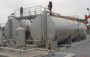 Image of two horizontal non-pressure hazmat tanks.