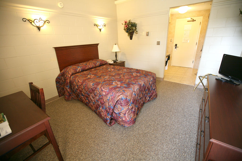 Rooms have full size beds, phones, study desk with chair, and alarm clock.
